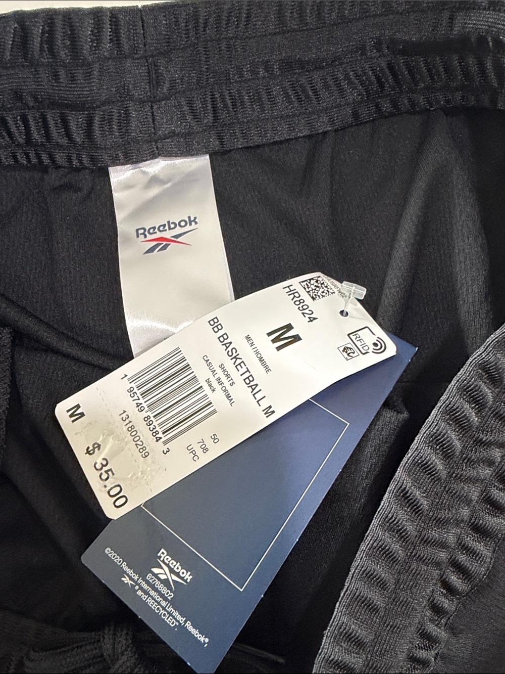 Reebok Men's Black Athletic Mesh Shorts with White Logo - Picture 4 of 4